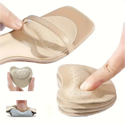 Mjuka framfotsdynor i beige material som ger dämpning och avlastning i högklackade och vardagsskor